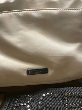 BCBGeneration Beige Crossbody Bag with Black Strap